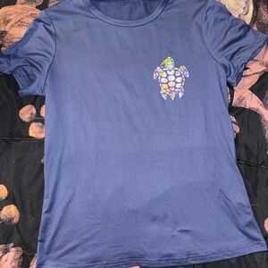 Blue T-Shirt with Colorful Turtle Design